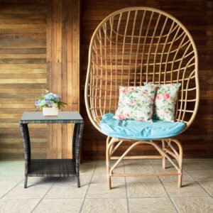 Outdoor Wicker Side Table with Glass Top beside Patio Egg Chair – Grey Gradient Rattan End Table for Relaxing Outdoor Seating