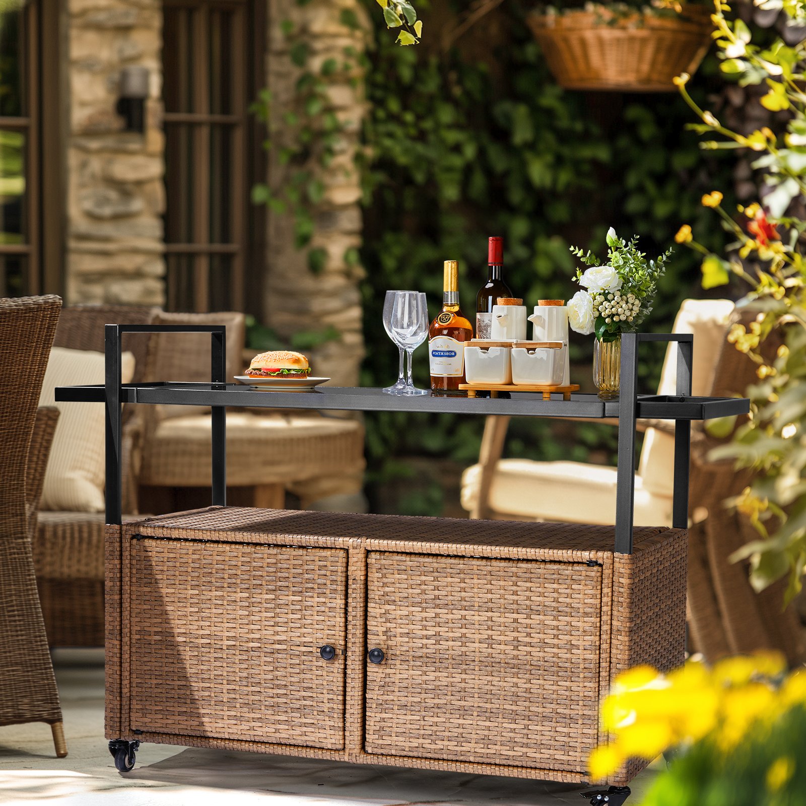 Light brown outdoor wicker bar cart used for patio drink serving