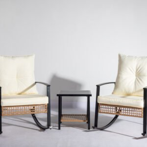 Wicker rocking chair set with side table arranged in a showroom with white backdrop
