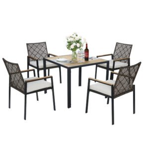 5-piece wicker dining set with acacia wood tabletop, surrounded by four chairs, featuring wine glasses, flowers, and dinnerware on the table