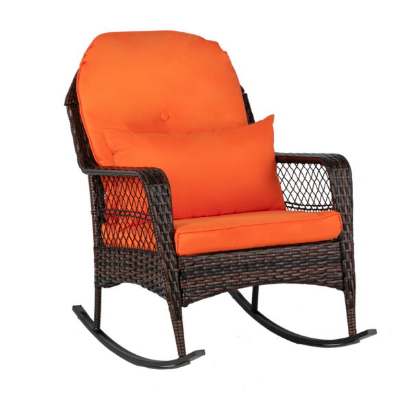 Brown gradient wicker rocking chair with orange cushions for outdoor patio