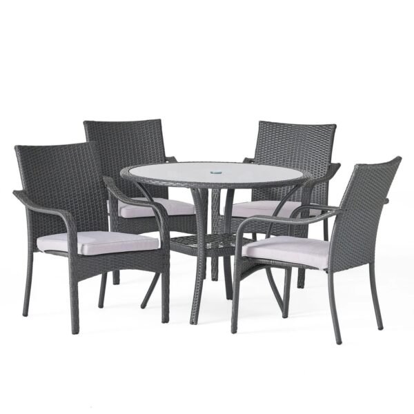 Gray rattan patio dining set with 4 gray cushioned chairs and glass table seats 4