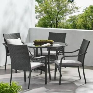 gray-rattan-patio-dining-set-rooftop-deck Gray rattan patio dining set on rooftop deck with green trees in the background