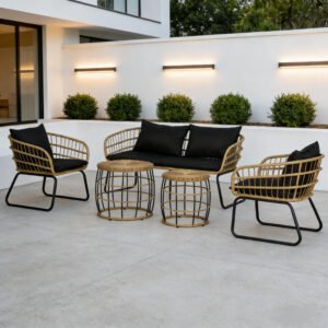 5-piece patio conversation set with loveseat, 2 chairs, and 2 round coffee tables placed on a backyard patio with cement flooring