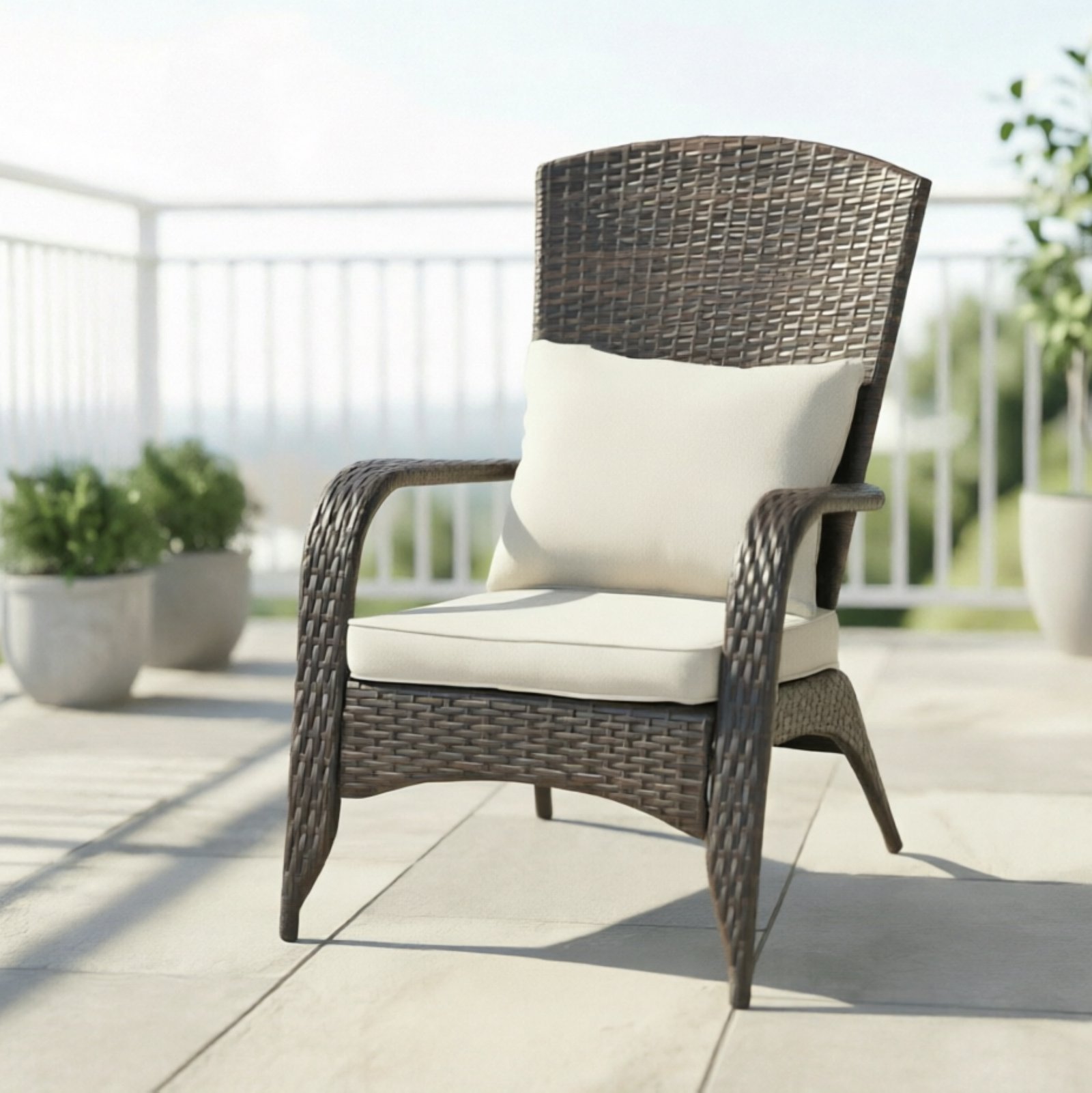 Front view of a brown wicker patio accent chair with plush beige seat and back cushions on a sunny front porch.