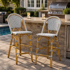 Black and white French bistro outdoor bar stools with bamboo-finish aluminum frame and PE rattan weave, set of 2 beside a backyard patio bar