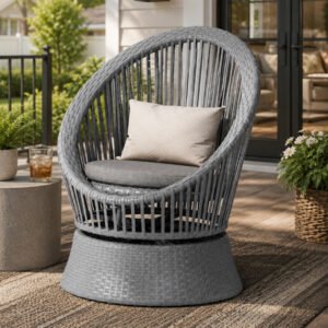 modern-swivel-wicker-lounge-chair-gray-patio-scene Gray modern swivel wicker lounge chair with cushion on a residential patio, featuring a round PE rattan design and comfortable swivel seating