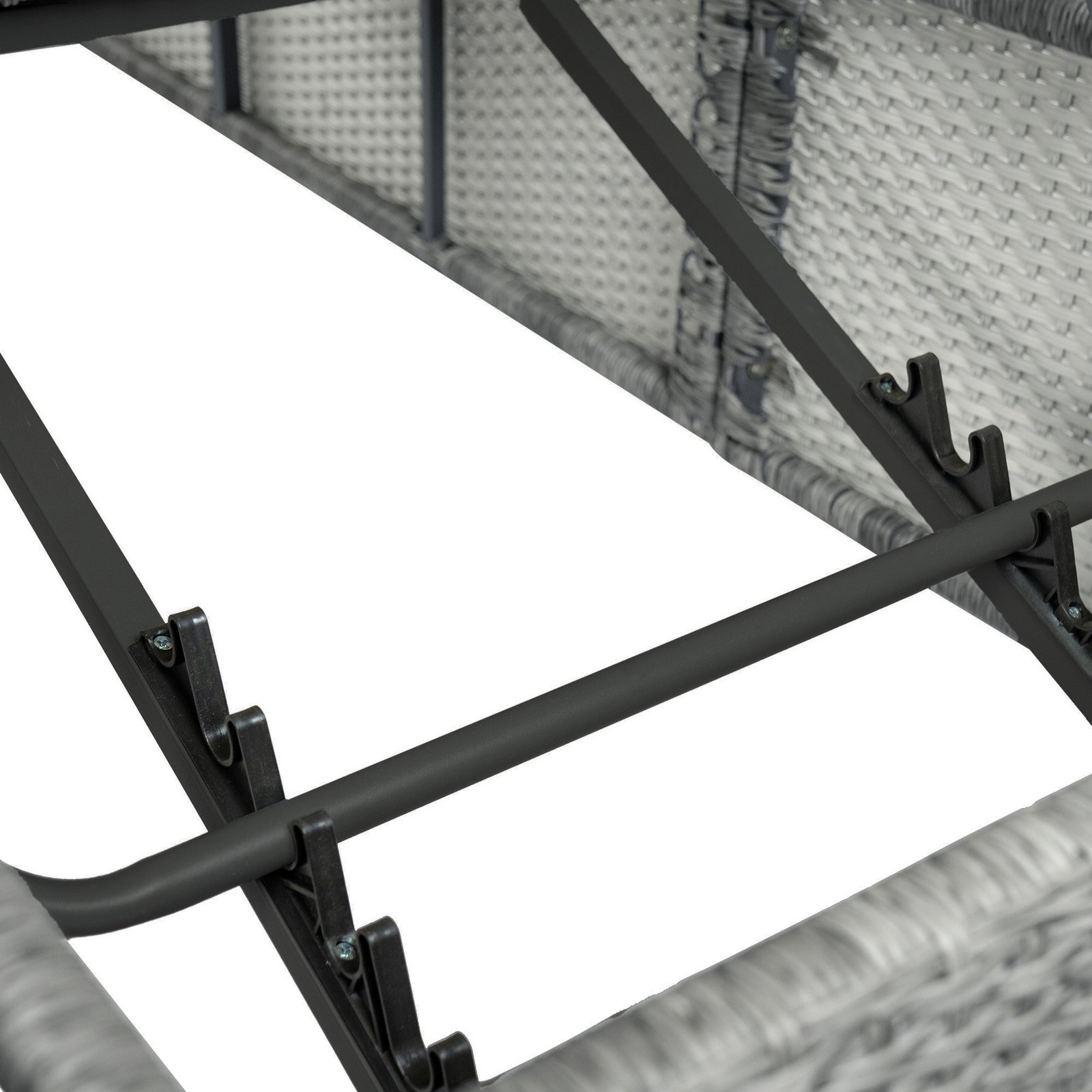 Close-up of adjustable outdoor sun lounger showing reclining support bracket and base structure mechanism for multi-position backrest adjustment