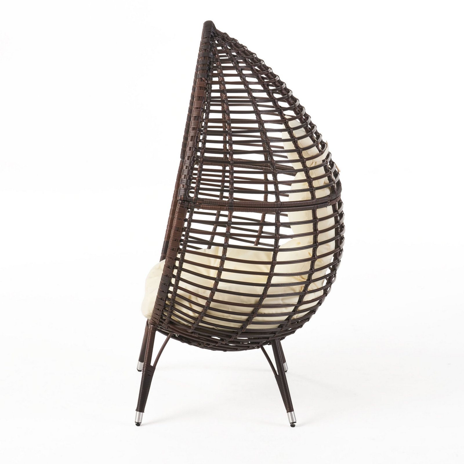 Side view of teardrop lounge chair with cushion, freestanding wicker basket chair with iron frame on a white background.