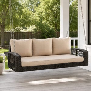 69 inch brown wicker porch swing with cushions and chains for outdoor patio backyard and garden