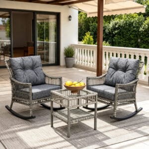 3 piece outdoor wicker rocking chair set with gray cushions and 2 tier glass coffee table on patio